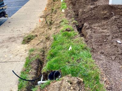 Irrigation pipe partially buried