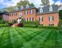 Residential property with striped grass