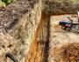 Trenches dug in preparation for building a retaining wall
