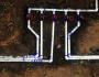 Underground irrigation manifold exposed