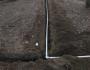 Irrigation trench in wet soil