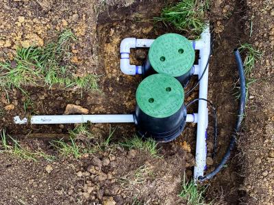 irrigation manifold with covers on